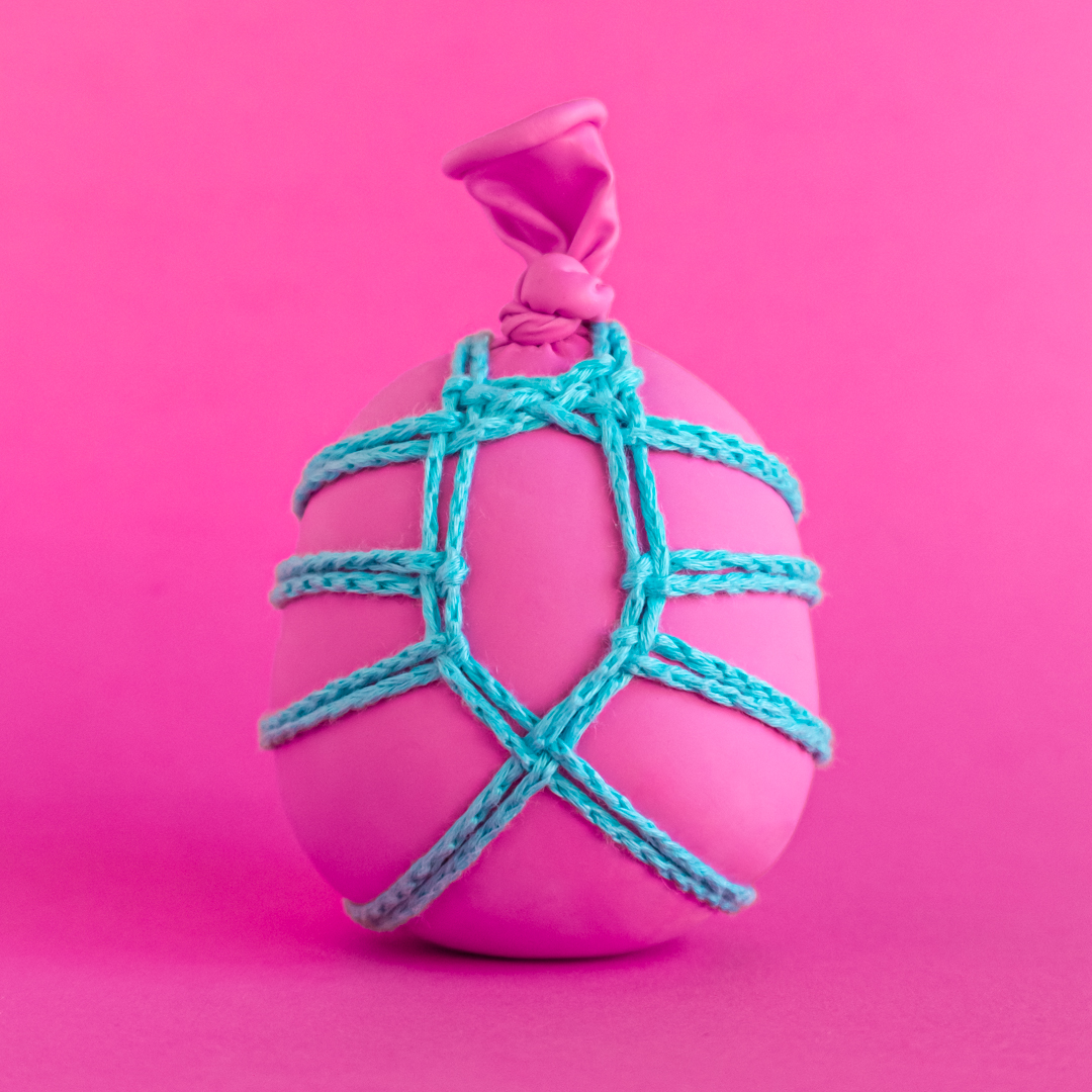 pink balloon with blue ropework