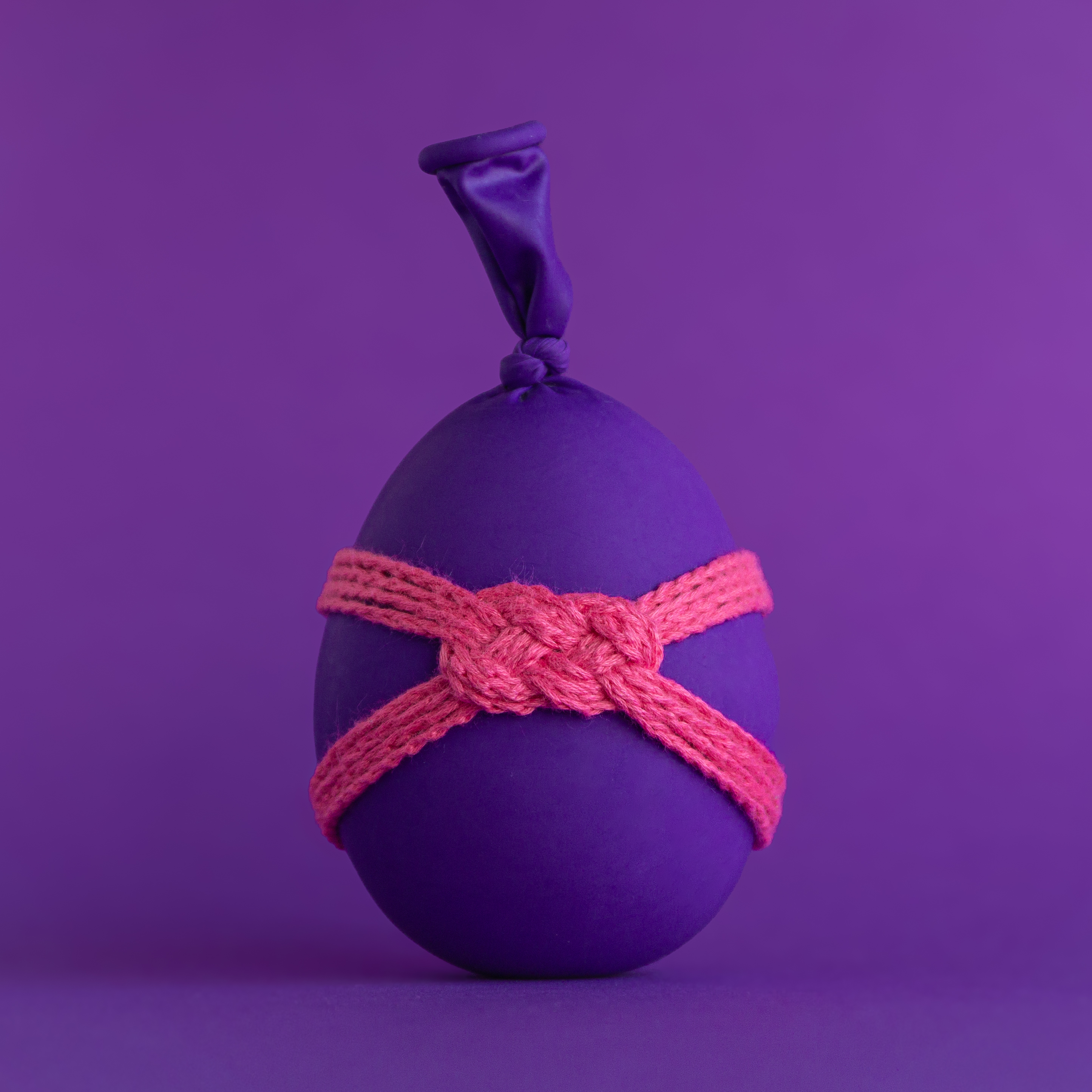 purple balloon with pink ropework